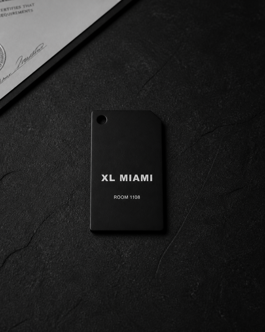 OBJECT / 001 XL HOTEL key on black stone